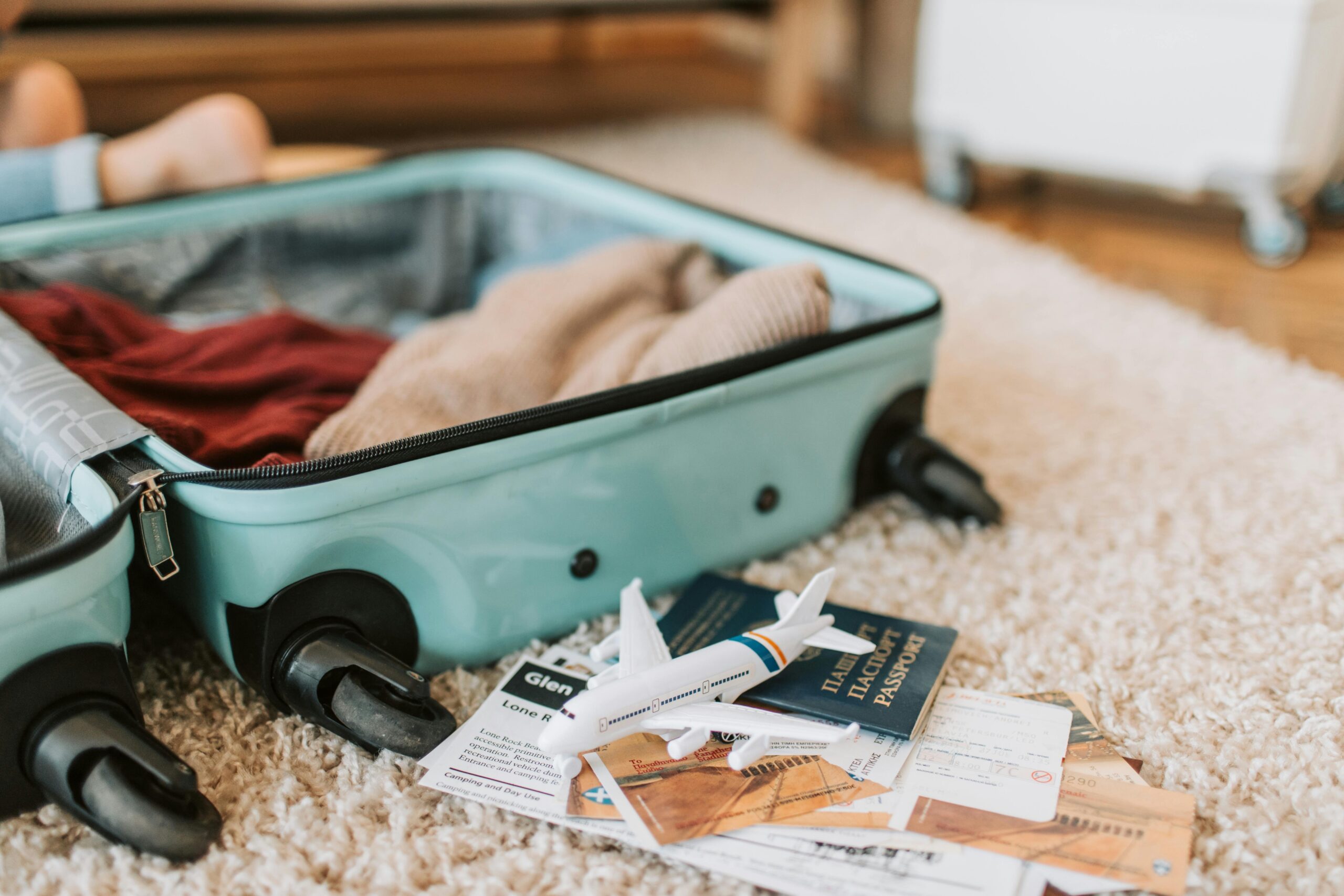 Close-up image of high-quality spinner wheels on a suitcase