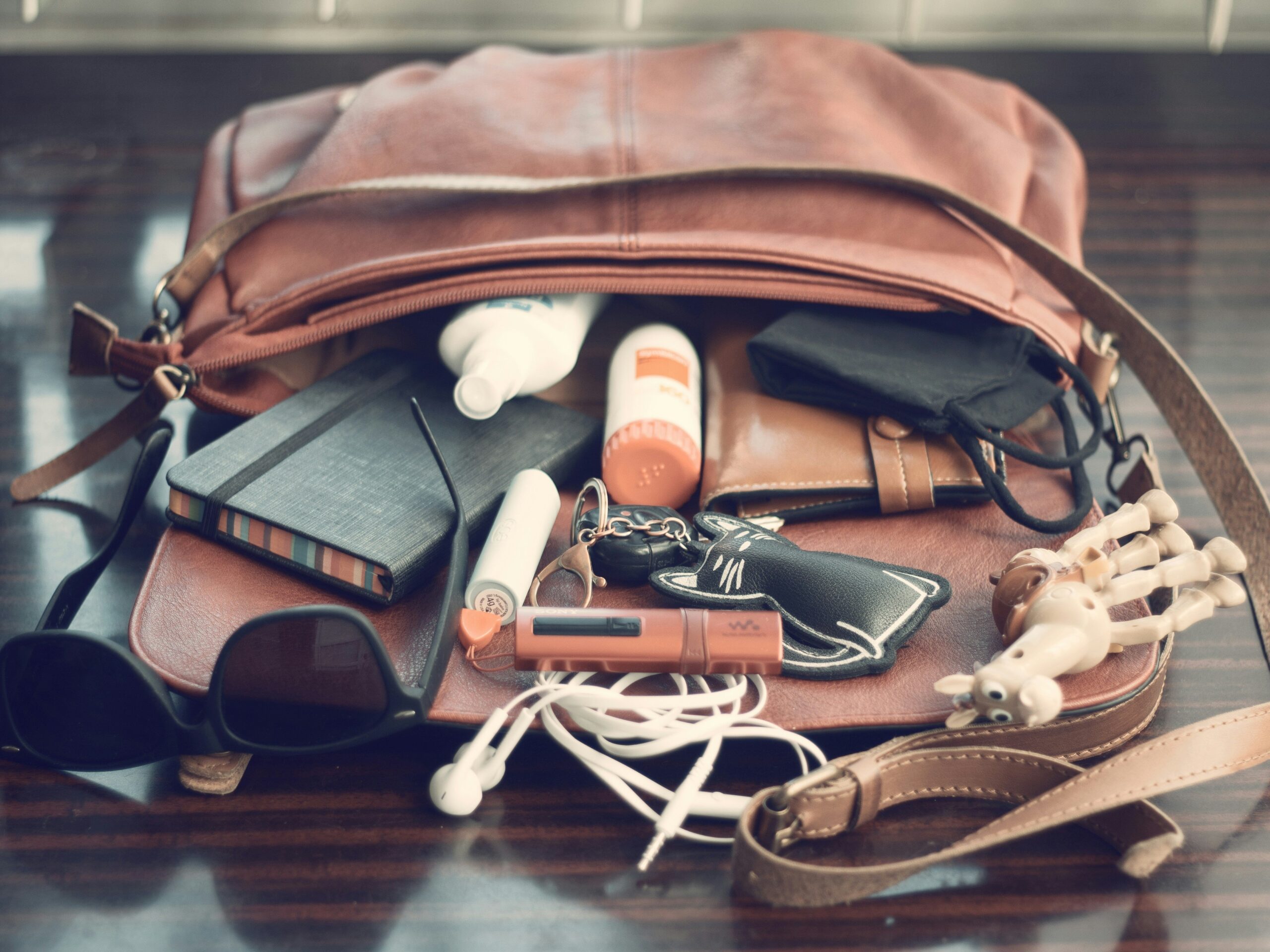Side-by-side comparison of different expandable suitcases