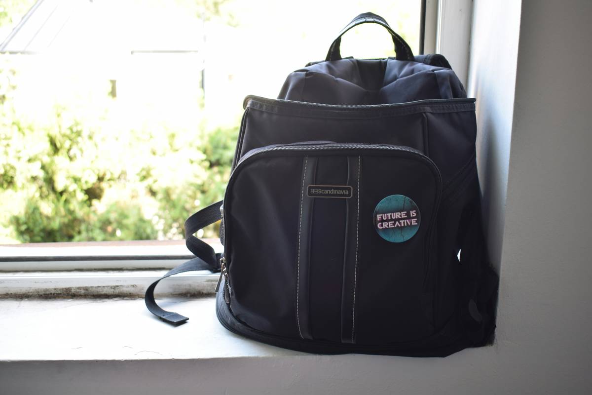 Comparison between expandable roller suitcase versus non-expandable duffel