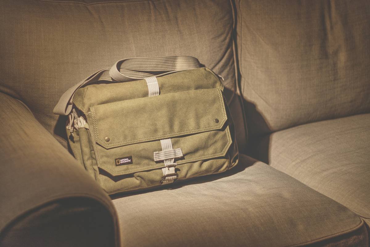 An overstuffed suitcase bursting open