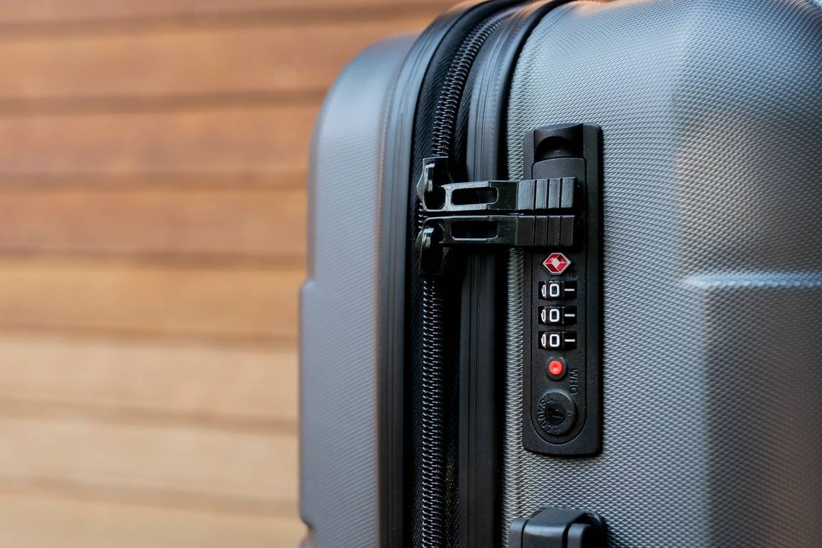 Side-by-side comparison: rigid packing cube bursting seams vs. flex pack organizer expanding smoothly inside open expandable suitcase