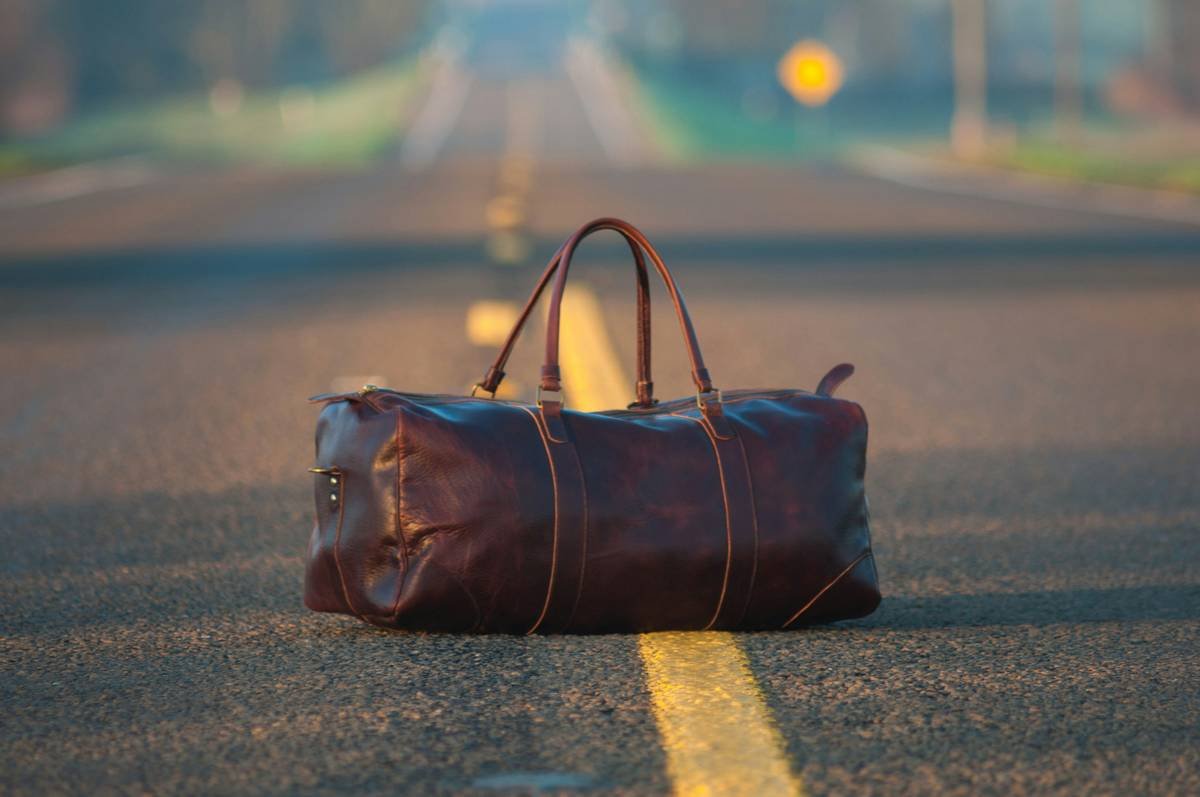 This bag was made by my good friend Jacob Moore of Moore Leather Goods, it is made with Bison Leather, and Solid Brass hardware. Hand stitched to boot. This is a road about ten minutes from my home in Texas.