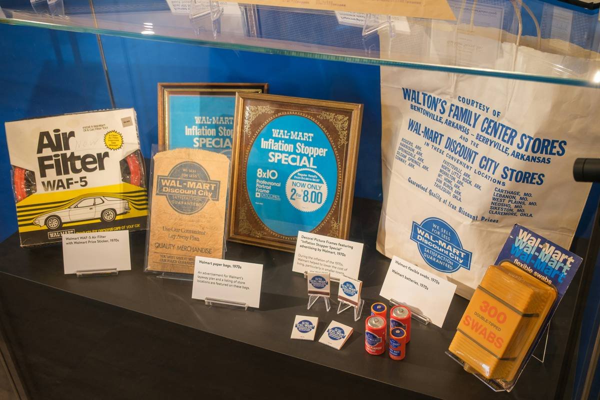 Vintage walmart promotional items and air filter display.